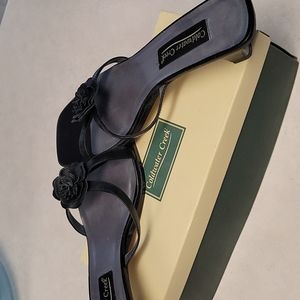 Black Flower slip on shoes